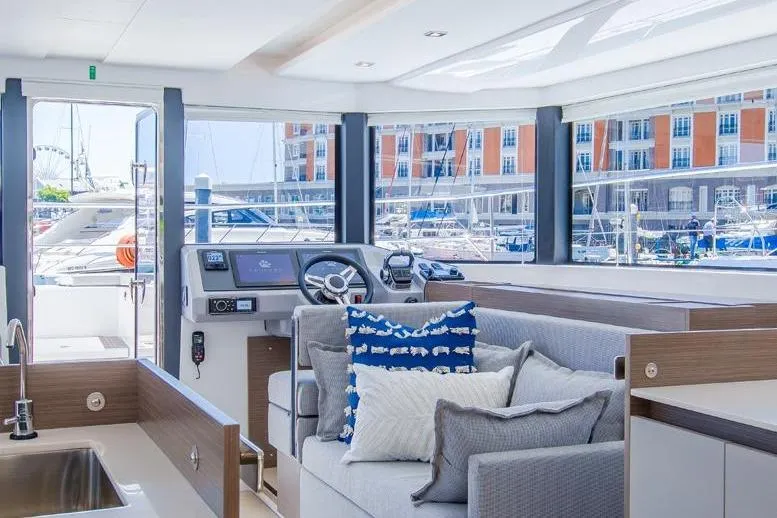  Yacht Photos Pics Interior of 2023 Leopard 46 Powercat yacht with modern design and marina view.