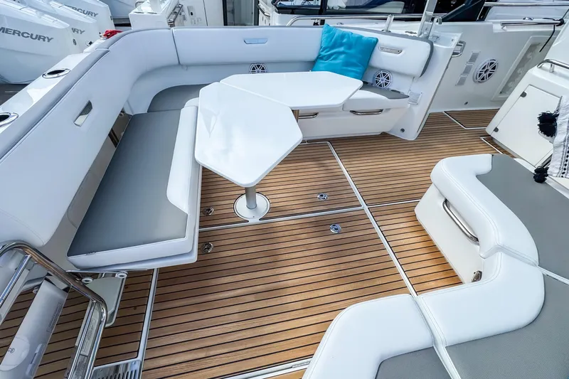  Yacht Photos Pics 2026 Wellcraft 38 T-Top boat interior with sleek seating and modern design.