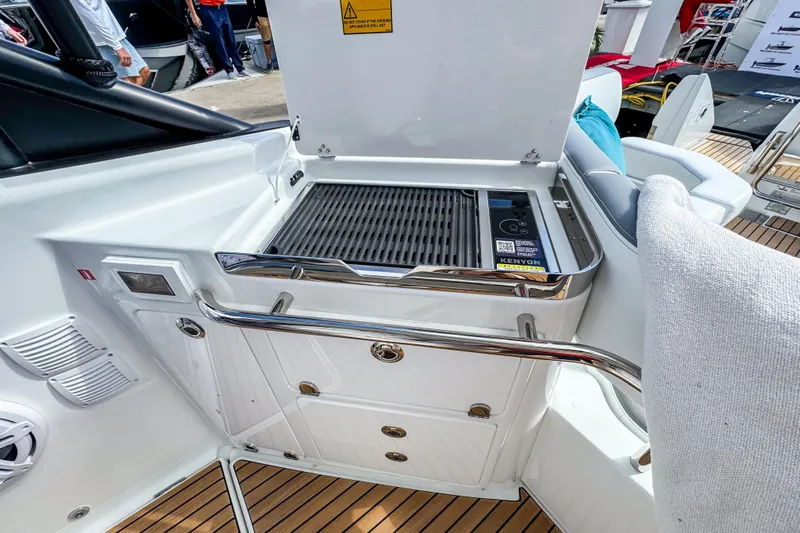  Yacht Photos Pics Outdoor grill on 2026 Wellcraft 38 T-Top boat, featuring sleek design and modern amenities.