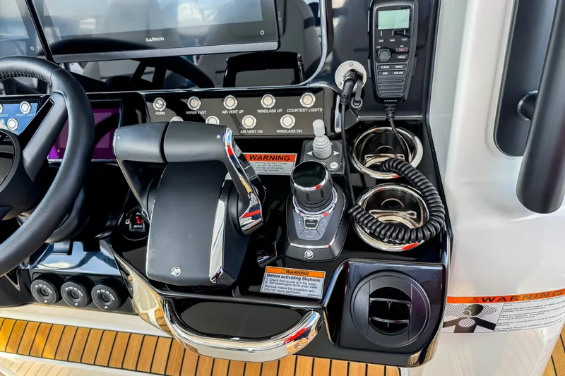  Yacht Photos Pics Control panel of 2026 Wellcraft 38 T-Top boat with advanced navigation and communication systems.