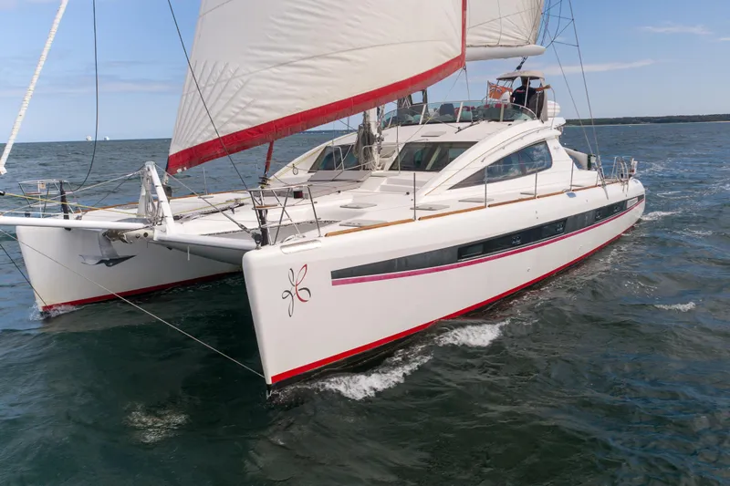 Tehiya Yacht Photos Pics Luxury 2009 Privilege 615 catamaran sailing on open water.