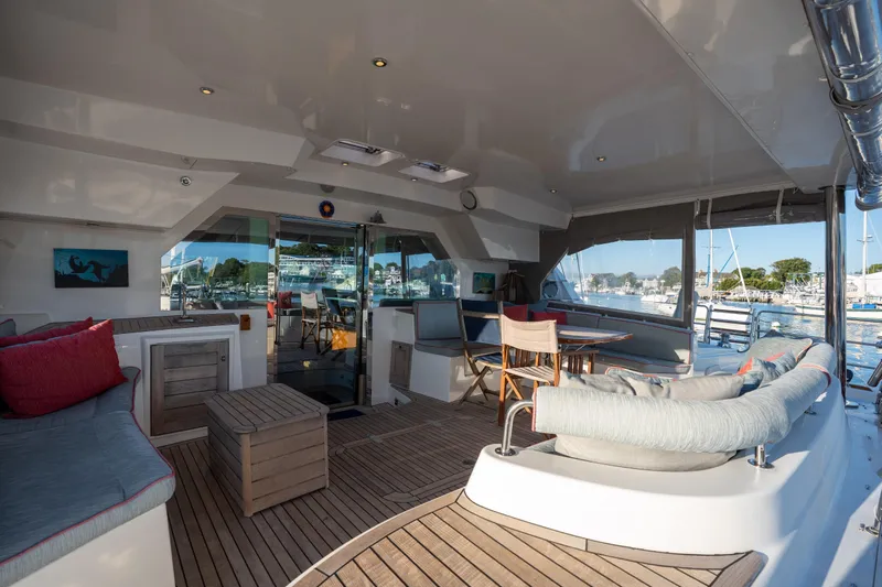 Tehiya Yacht Photos Pics Luxurious 2009 Privilege 615 yacht interior with elegant seating and marina view.