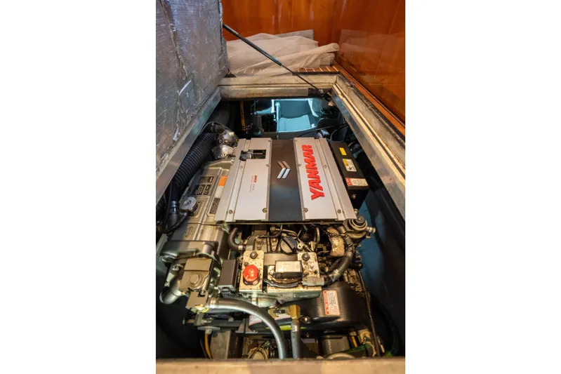 Tehiya Yacht Photos Pics Engine compartment of a 2009 Privilege 615 yacht featuring a Yanmar engine.