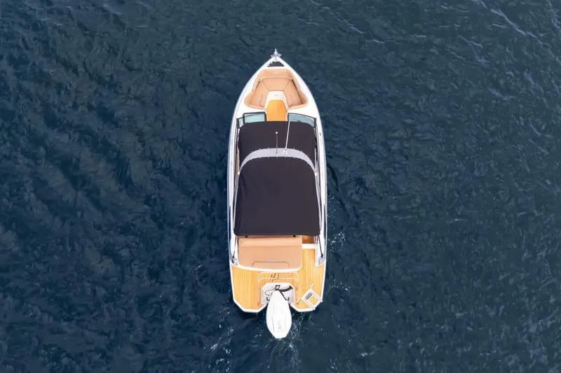  Yacht Photos Pics Aerial view of 2025 Hanover 255 boat on open water.