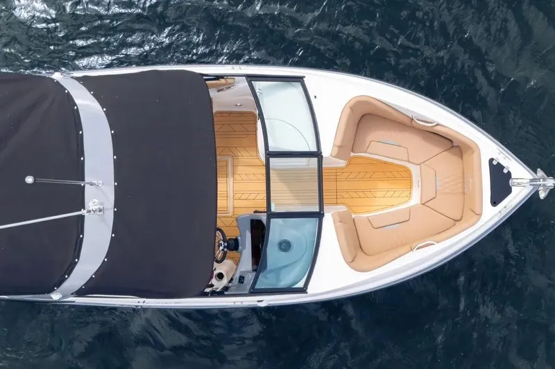  Yacht Photos Pics Aerial view of 2025 Hanover 255 boat with sleek design and spacious seating.