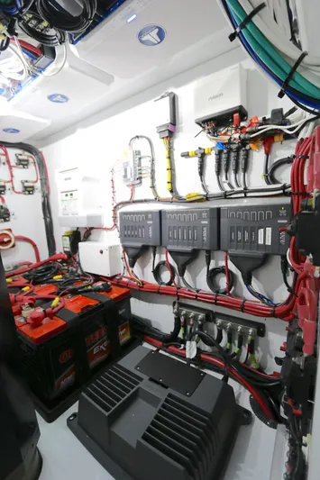 Alegria Yacht Photos Pics Electrical system of a 2021 Yellowfin 54 Offshore boat, showcasing wiring and components.