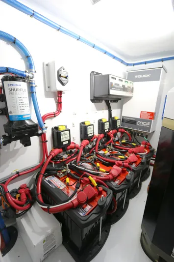 Alegria Yacht Photos Pics Engine room of 2021 Yellowfin 54 Offshore with batteries and wiring.