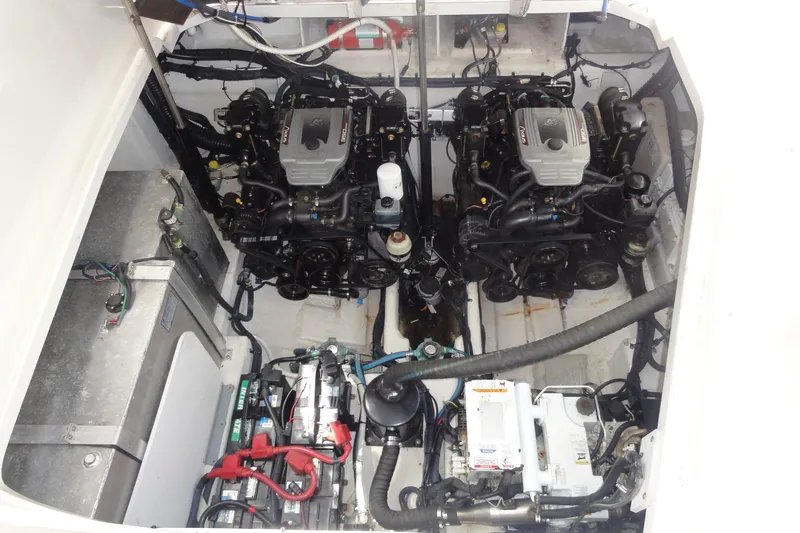 Sar Erinity Yacht Photos Pics Engine compartment of 2009 Sea Ray 310 Sundancer with dual engines and mechanical components.