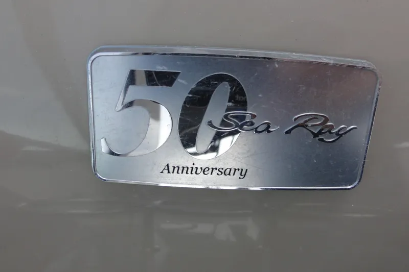 Sar Erinity Yacht Photos Pics 50th Anniversary Sea Ray badge on 2009 Sea Ray 310 Sundancer boat.
