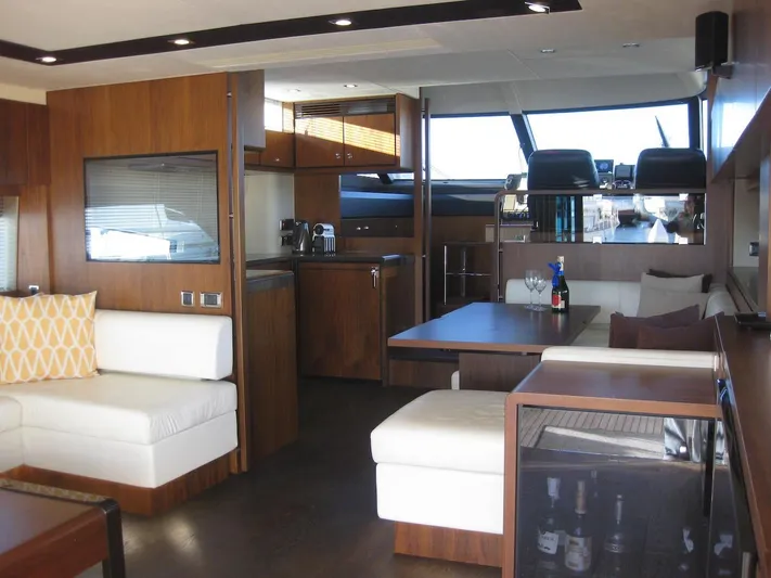  Yacht Photos Pics Luxurious interior of 2015 Fairline Squadron 65 yacht with modern furnishings and elegant design.
