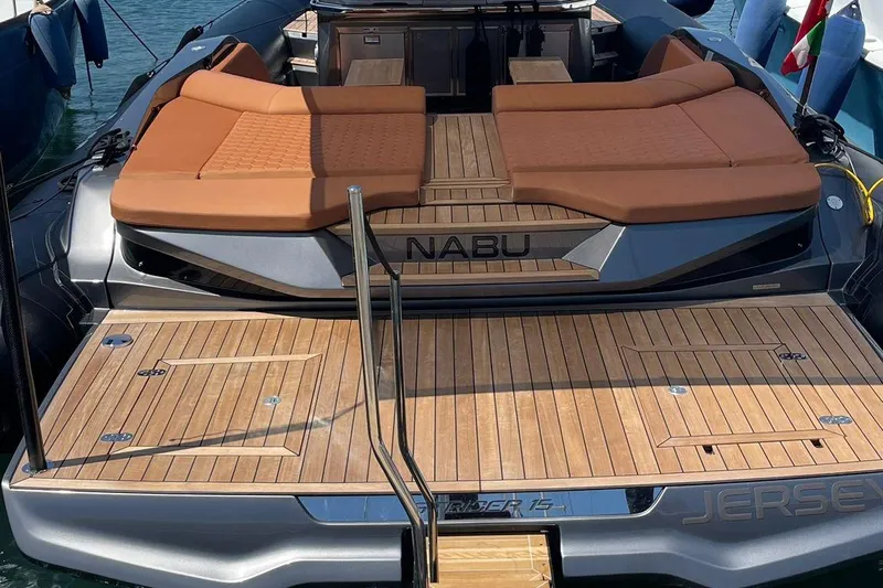 Nabu Yacht Photos Pics 2023 SACS Strider 15 luxury yacht with teak deck and cushioned seating.