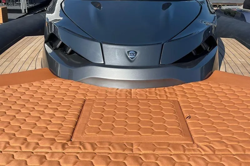 Nabu Yacht Photos Pics 2023 SACS Strider 15 yacht with sleek design and luxurious tan upholstery.