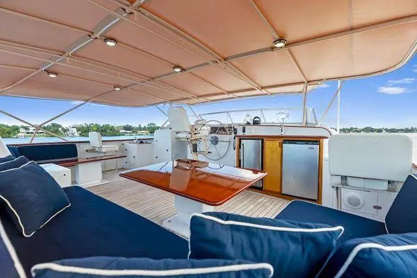 Chanticleer Yacht Photos Pics Luxurious 1973 Burger 310C yacht interior with elegant seating and modern amenities.