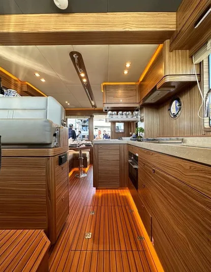Nordhavn 41 Yacht Photos Pics Luxurious interior of 2022 Nordhavn 41 yacht with modern wood finishes and ambient lighting.