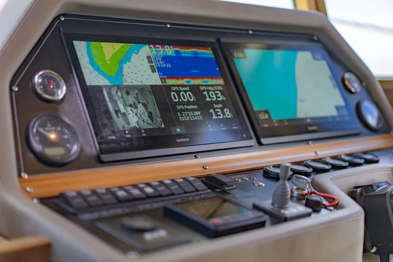 Nordhavn 41 Yacht Photos Pics Control panel of 2023 Nordhavn 41 yacht with navigation screens and instruments.