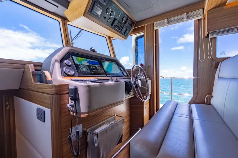 Nordhavn 41 Yacht Photos Pics 2023 Nordhavn 41 yacht interior with modern helm and ocean view.