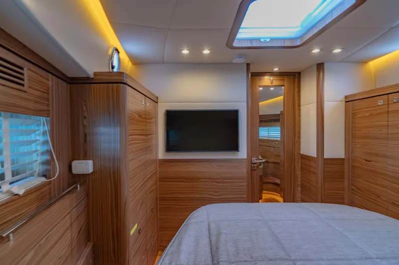 Nordhavn 41 Yacht Photos Pics Luxurious 2023 Nordhavn 41 yacht cabin with wood paneling and skylight.