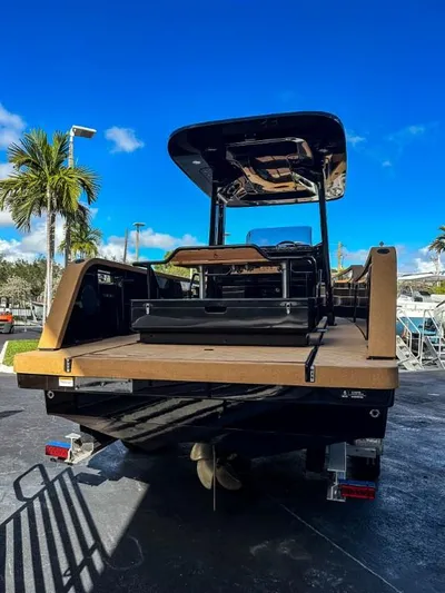  Yacht Photos Pics 2023 X Shore Eelex 8000 electric boat, rear view, docked under a clear blue sky.