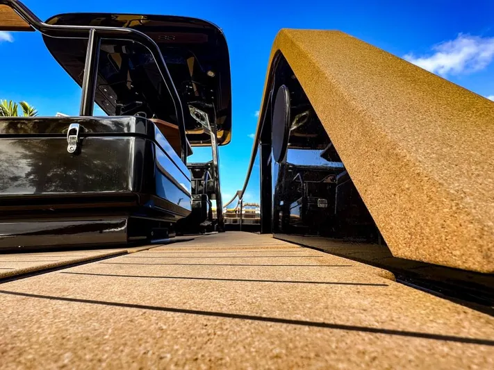  Yacht Photos Pics 2023 X Shore Eelex 8000 electric boat docked under a clear blue sky.