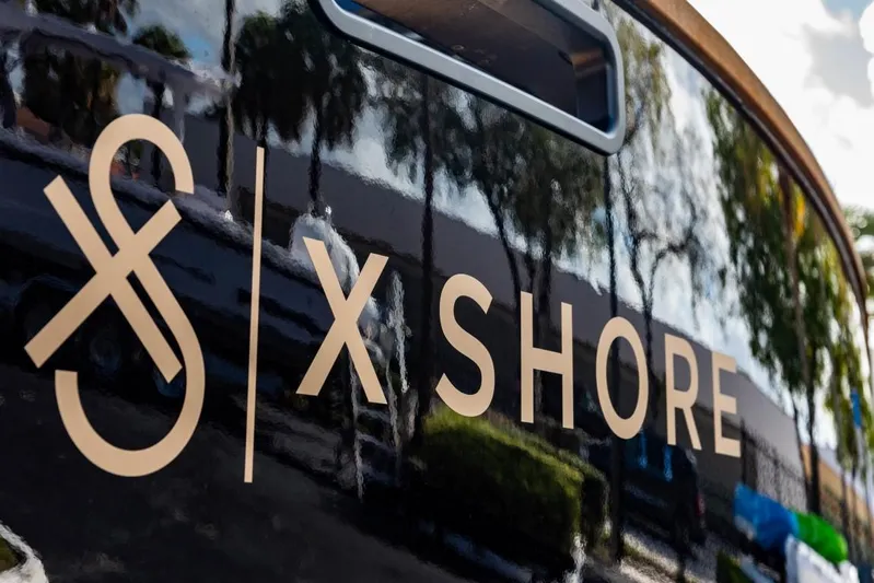  Yacht Photos Pics X Shore Eelex 8000 2023 logo on a sleek black surface.