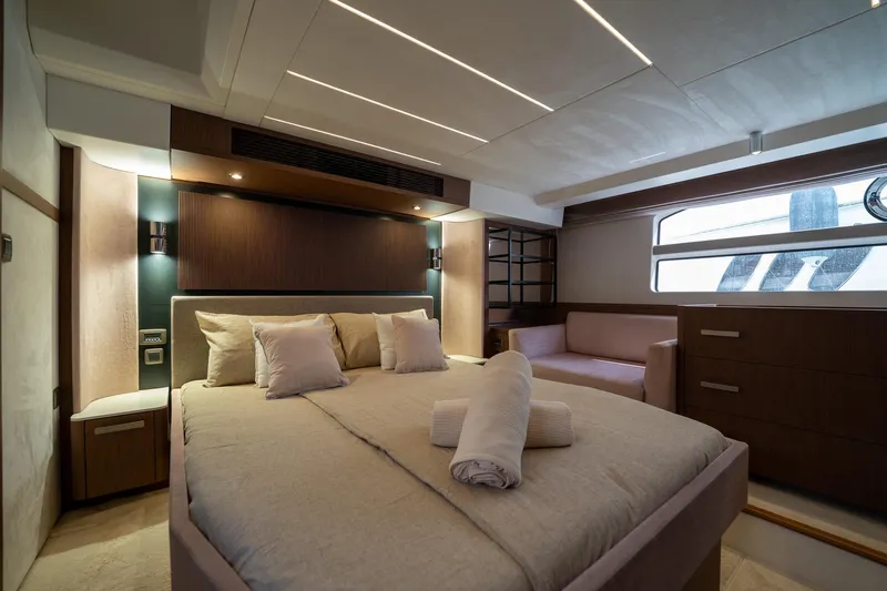  Yacht Photos Pics Luxurious 2023 Prestige X60 yacht bedroom with modern design and elegant furnishings.