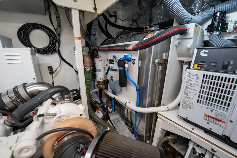  Yacht Photos Pics Engine room of 2023 Prestige X60 yacht with advanced mechanical systems and wiring.