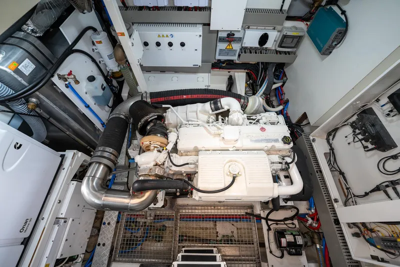  Yacht Photos Pics Engine room of 2023 Prestige X60 yacht with advanced mechanical systems and components.
