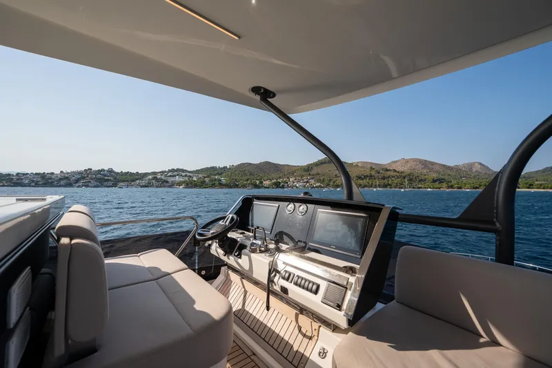  Yacht Photos Pics Luxurious 2023 Prestige X60 yacht interior with scenic ocean view.