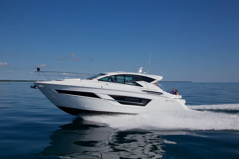  Yacht Photos Pics 2026 Cruisers Yachts 46 Cantius cruising on calm blue waters.