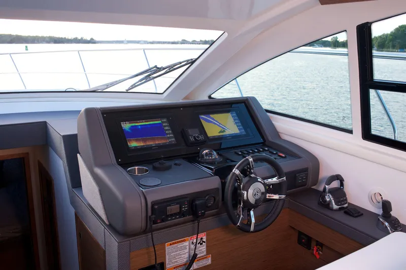  Yacht Photos Pics Helm of 2026 Cruisers Yachts 46 Cantius with advanced navigation systems.