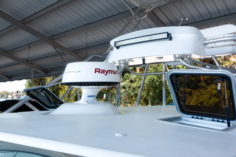 Her Majesty Yacht Photos Pics 2007 Tiara Yachts 3800 Open with Raymarine radar and open hatch on deck.