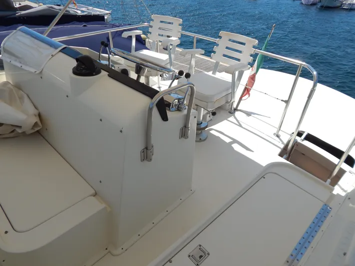  Yacht Photos Pics 1989 Hatteras 45 Convertible yacht deck with seating and ocean view.