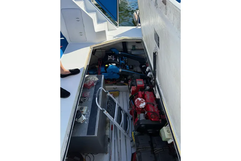 Ski Breeze Yacht Photos Pics Engine compartment of a 1996 Harbor Master 52 Wide Body boat, showing mechanical components.