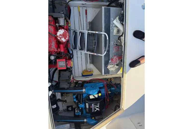 Ski Breeze Yacht Photos Pics Engine compartment of a 1996 Harbor Master 52 Wide Body boat, showing mechanical components.