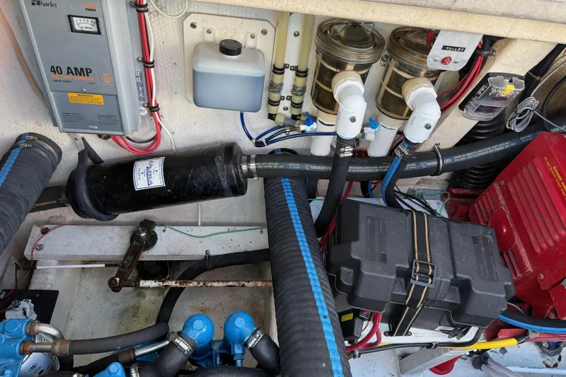 Ski Breeze Yacht Photos Pics Engine room of a 1996 Harbor Master 52 Wide Body with various mechanical components.