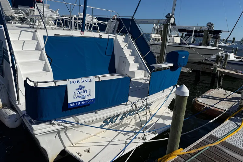 Ski Breeze Yacht Photos Pics 1996 Harbor Master 52 Wide Body yacht for sale at marina dock.