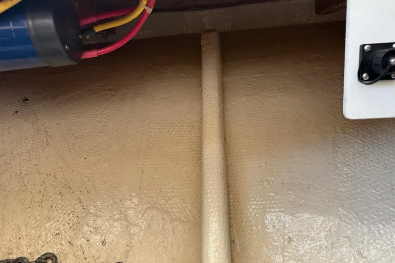 Ski Breeze Yacht Photos Pics 1996 Harbor Master 52 Wide Body boat interior with wiring and textured surface.