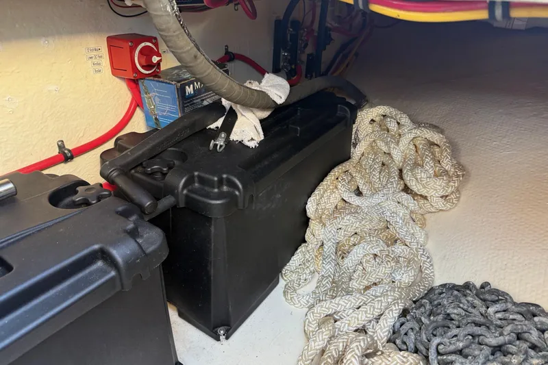 Ski Breeze Yacht Photos Pics Battery compartment with cables and ropes on a 1996 Harbor Master 52 Wide Body boat.