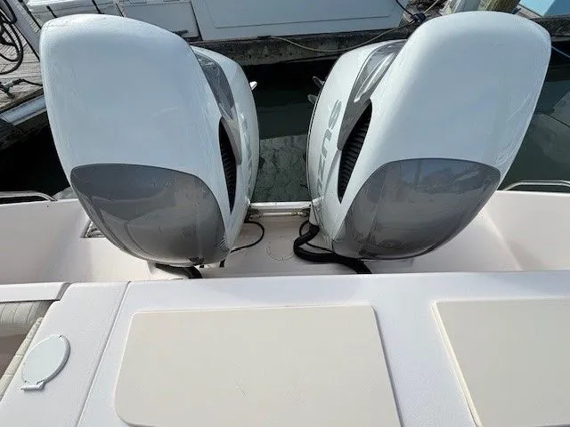 Star-k-2 Yacht Photos Pics 2008 Grady-White Bimini 306 with twin outboard engines at the dock.