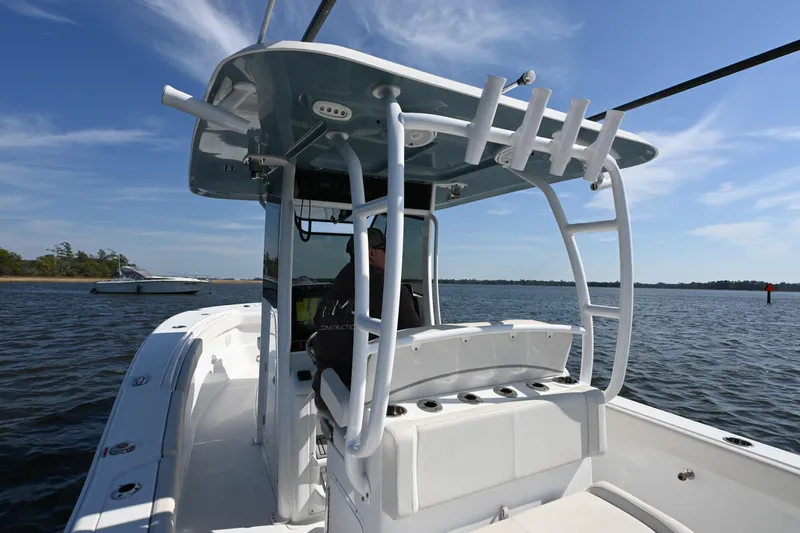 Yacht Photos Pics 2024 Sea Hunt Gamefish 28 boat on water, featuring a sleek design and spacious deck.