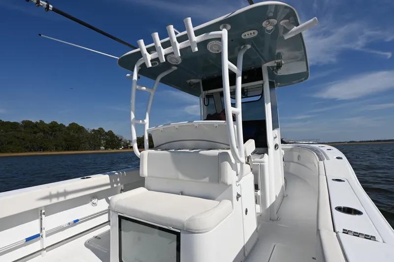  Yacht Photos Pics 2024 Sea Hunt Gamefish 28 boat on water, featuring spacious deck and seating.