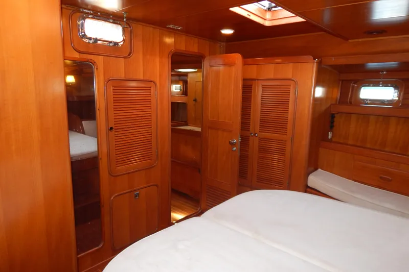  Yacht Photos Pics Luxurious wooden interior of a 1992 Tayana 55 yacht cabin.