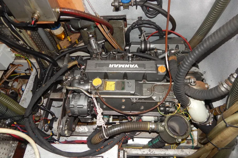  Yacht Photos Pics Engine compartment of a 1992 Tayana 55 sailboat with Yanmar engine.