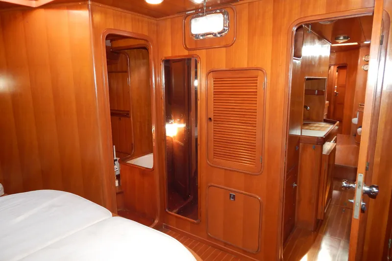  Yacht Photos Pics Interior of 1992 Tayana 55 yacht with wooden paneling and cozy cabin layout.