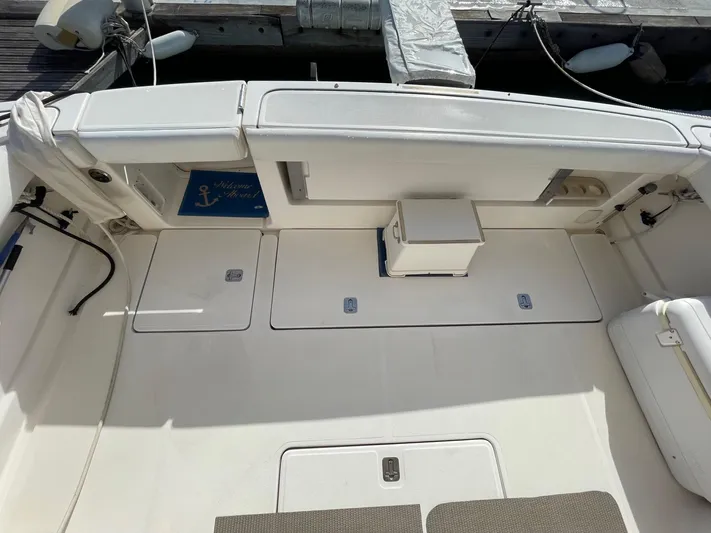  Yacht Photos Pics 2007 Tiara Yachts 3800 Open deck, featuring spacious seating and storage compartments.