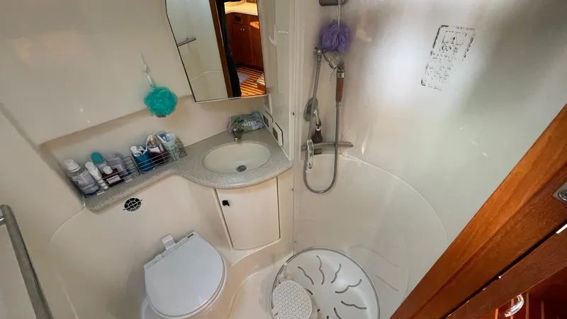  Yacht Photos Pics 2007 Tiara Yachts 3800 Open bathroom with shower, sink, and toilet.