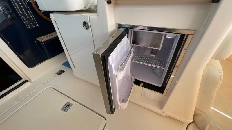  Yacht Photos Pics Open mini fridge on 2007 Tiara Yachts 3800 Open boat interior.
