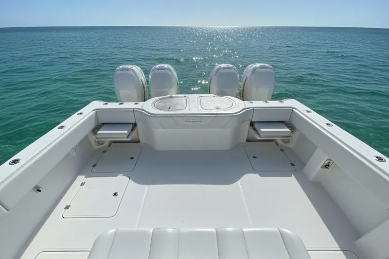 Trailer Included Yacht Photos Pics 2019 Invincible 40 Catamaran deck with ocean view and multiple outboard engines.