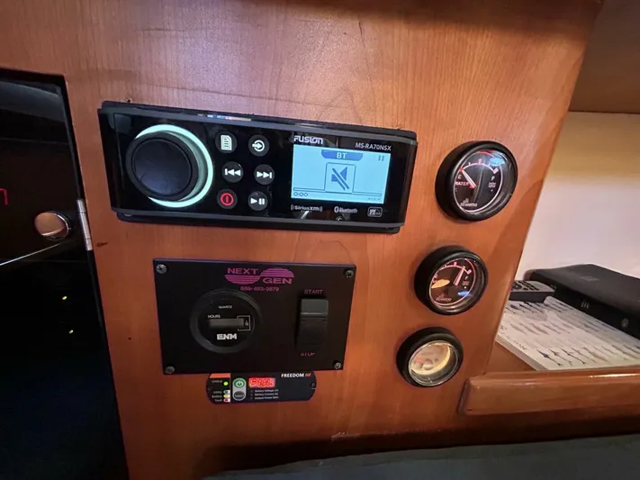 N'baluba Yacht Photos Pics Control panel in a 2008 Rivolta Coupe 4.5 with audio system and gauges.