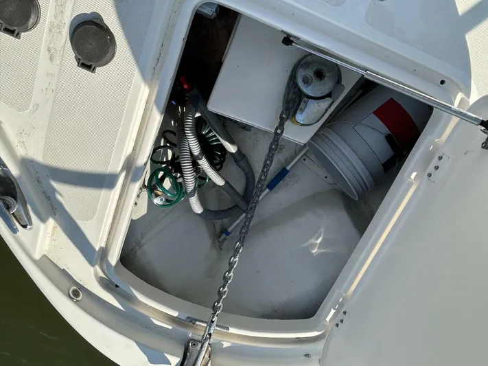 N'baluba Yacht Photos Pics Storage compartment on a 2008 Rivolta Coupe 4.5 boat with equipment and supplies.